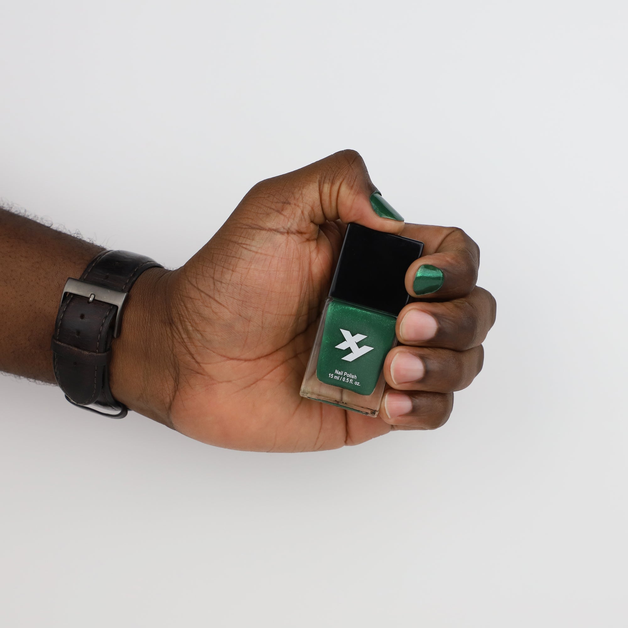 Model holding a bottle of Maverick Y nail polish